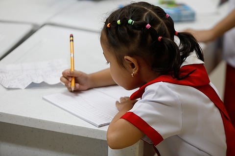 A TOTAL of 27.6 million Filipino kids, including this girl, registered for school this academic year.
