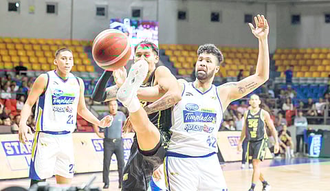 (FILE) DOGFIGHT looms as Poy Erram and the TNT Tropang Giga collide with James Laput and the Magnolia Hotshots in the quarterfinals of the PBA Philippine Cup.