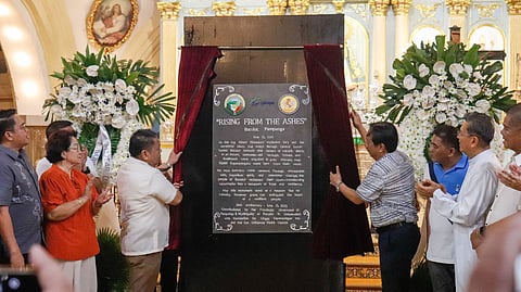 Local officials from the provincial government of Pampanga unveil a marker at the San Guillermo Parish Church during the 34th commemoration of the infamous Mt. Pinatubo eruption.