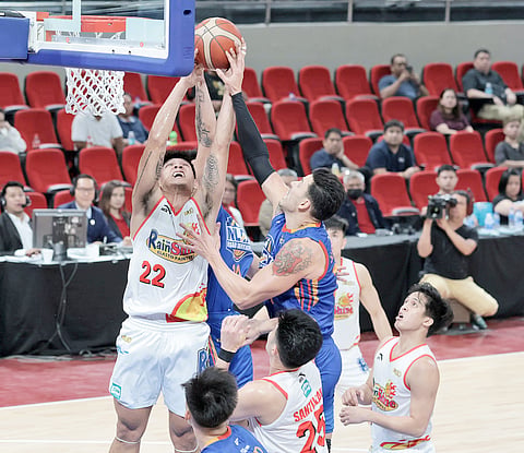 JHONARD Clarito soars for a rebound during Rain or Shine’s 92-89 win over NLEX in the quarterfinals of the PBA Philippine Cup last night at the Philsports Arena.   