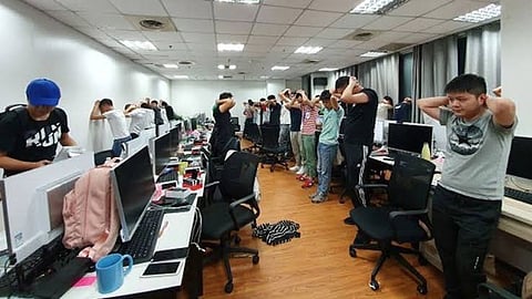 Online scammers posing call center agents that were recently arrested by the Philippine National Police in a raid in Makati City.