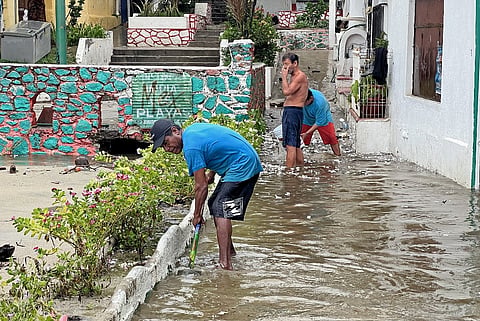 Residents try to drain water out of their houses following the passage of Hurricane Erick in Bahia Principal, Puerto Escondido, state of Oaxaca, Mexico, on 19 June 2025. Erick, a category 4 hurricane on a scale of 5, made landfall in the Mexican state of Oaxaca (west) on the Pacific coast, the United States National Hurricane Center (NHC) reported.
