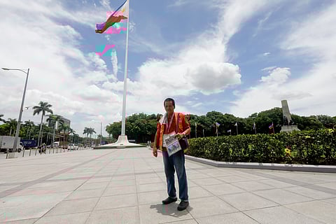 Veteran photographer Nel Mallari strikes a pose beside the Rizal Monument in Luneta as the nation marks the birth anniversary of National Hero Dr. Jose Rizal on Thursday, 19 June 2025. A lensman since the 1980s, Mallari has witnessed the evolution of photography — from the age of film to the rise of digital imaging.