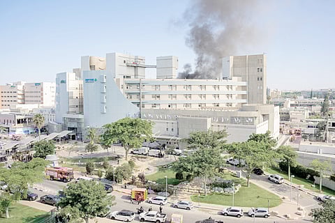 SMOKE billows from a building at Soroka Hospital in Beersheba in southern Israel following an Iranian missile attack, on 19 June 2025. 