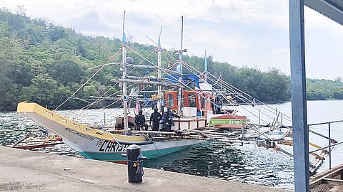 AUTHORITIES inspect part of the 1.5 tons of suspected shabu seized from a fishing vessel off Subic, Zambales on Friday. The operation, one of the country’s largest drug busts, was the result of weeks of intelligence work by the Navy and PDEA.