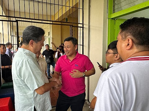 Department of Education Secretary Sonny Angara (center) speaks with officials of Enchanted Kingdom, the local government of Santa Rosa in Laguna and the city’s School Division Office during the Brigada Eskwela program launched the agency ahead of the start of the school year.