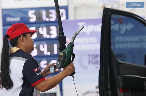 GAS station personnel assist motorists refueling at a station along East Avenue in Quezon City on Friday, 20 June. The Department of Energy warned that diesel prices may increase by up to P5 per liter next week due to rising global oil prices. President Ferdinand Marcos Jr. earlier said the government is prepared to provide fuel subsidies to sectors most affected by potential oil supply disruptions stemming from tensions between Israel and Iran.