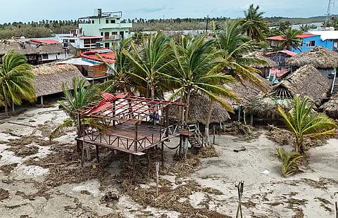 AN aerial view of the damages following the passage of Hurricane Erick in Chacahua, Oaxaca state, Mexico on June 19, 2025. Hurricane Erick was downgraded on June 19, 2025, to a tropical storm as it advanced through southern Mexico, after entering the country's Pacific coast early this morning, where it left only material damage, authorities reported.