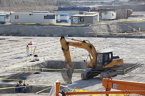 A picture taken on November 10, 2019, shows an excavator used by workers on a construction site in Iran's Bushehr nuclear power plant, during an official ceremony to kick-start works for a second reactor at the facility. Bushehr is Iran's only nuclear power station and is currently running on imported fuel from Russia that is closely monitored by the UN's International Atomic Energy Agency.
