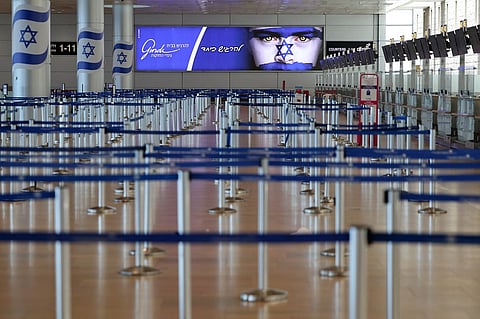 This picture shows the empty departure hall at Ben Gurion Airport near Tel Aviv on June 13, 2025 after Israel closed its air space to takeoff and landing. Israel pounded Iran in a series of air raids on June 13, striking 100 targets including Tehran's nuclear and military sites, and killing the armed forces' chief of staff, the head of Iran's Revolutionary Guards and top nuclear scientists. Iran launched 100 drones in response towards Israel whose defences were working to intercept, the Israeli military said.
