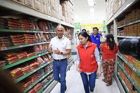 Trade Secretary Cristina Roque (in red vest) talks to a supermarket manager in one of her rounds to inspect the prices of commodities in Metro Manila. The Philippine Amalgamated Supermarkets Association said on Monday that prices of goods are expected to go up in the coming weeks, particularly if the Israel-Iran conflict worsens. The US has joined the fray after it dropped bunker blaster bombs on various uranium enrichment sites in Iran.