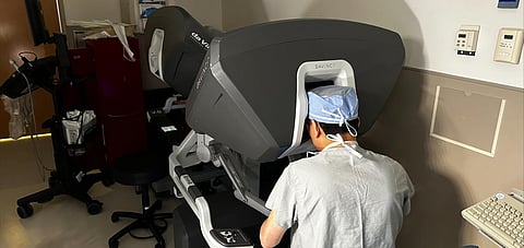 DR. KENNETH Liao can be seen using the surgical robot, the same device he used to perform the first successful, fully robotic heart transplants on an adult patient in the United States.