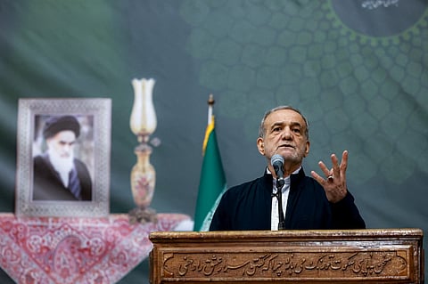 This handout picture provided by the Iranian presidency shows Iran's President Masoud Pezeshkian giving an address on the anniversary of the death of the country's former supreme leader Ayatollah Ruhollah Khomeini at the latter's mausoleum in Tehran on June 3, 2025.
