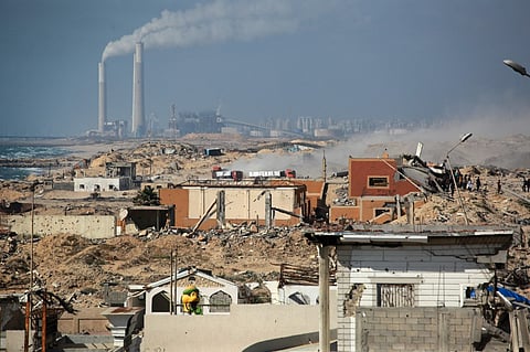 A convoy of trucks carrying aid drives after entering the Gaza Strip from the Israeli-controlled Zikim crossing, west of Beit Lahia in the north of the besieged Palestinian territory on June 25, 2025. Rights groups say Gaza and its population of more than two million face famine-like conditions due to Israeli restrictions, with near-daily deaths of people queuing for food aid.
