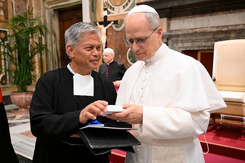 POPE Leo XIV meets with the Brothers of the Christian Schools, also known as the De La Salle Brothers, led by superior general Br. Armin Luistro, during an audience at the Vatican on May 15 to mark the 75th anniversary of the proclamation of St. John Baptist de La Salle as the patron of Christian teachers.