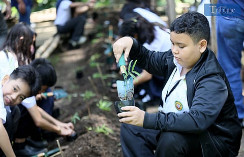 PLANTING A GREENER FUTURE. Manila Water, together with Miss Earth 2024, marked Arbor Day by teaching students from schools in Marikina and Pasig how to plant trees during an environmental activity held at La Mesa Eco Park in Quezon City on Wednesday, June 25, 2025. Arbor Day in the Philippines, observed every 25 June, is dedicated to raising awareness on the importance of trees, as mandated by Presidential Proclamation No. 643 and Republic Act No. 10176.