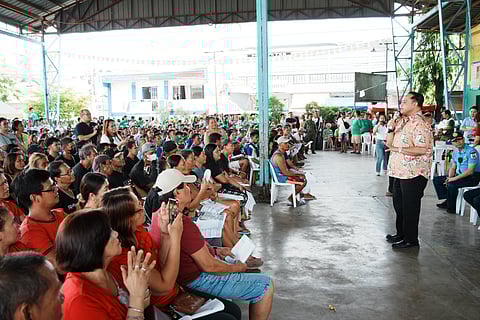 Beneficiaries await their financial assistance of P5,625 each at the Sasmuan Covered Court at Barangay Sta. Catalina, Lubao. A total of 1,815 residents of the town of Sasmuan has received a total of P10.2-million worth of assistance from the Provincial Government after being adversely affected by the recent typhoons last year.