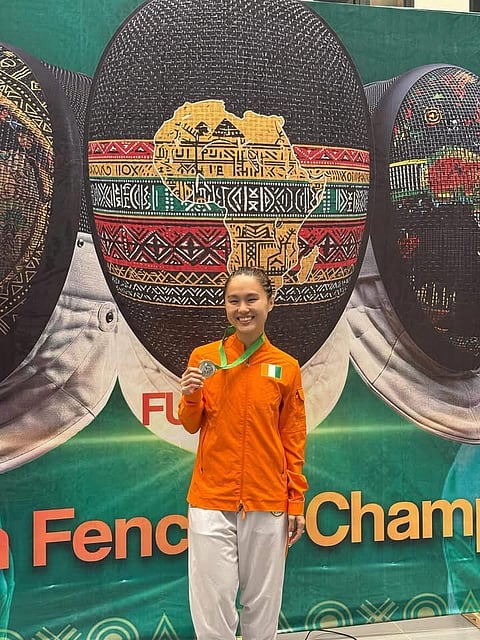 MAXINE Esteban smiles after winning the silver medal in the 23rd African Fencing Championships in Lagos, Nigeria last Thursday.    MAXINE ESTEBAN / FB