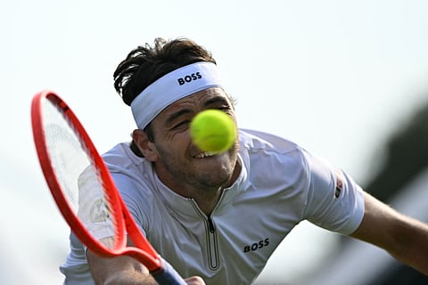 TAYLOR Fritz displays steely resolve to book a 7-5, 4-6, 7-5 win over Marcos Giron and advance to the semifinals of the Eastbourne Open on Thursday.
