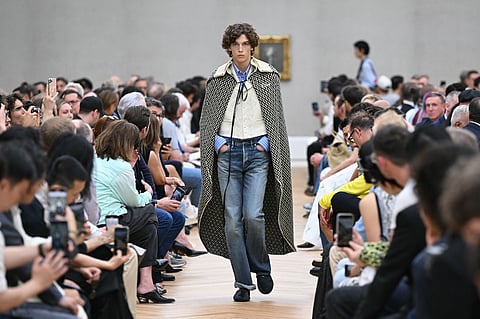 A model presents a creation by Dior Homme for the Menswear Ready-to-wear Spring-Summer 2026 collection as part of the Paris Fashion Week in Paris, on June 27, 2025.
