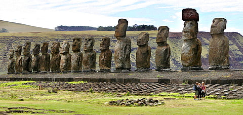 The 15 Tongariki moai, standing erect in rigid military attention, are the largest statues on the island. 