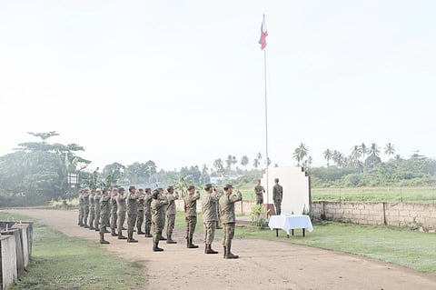 SOLDIERS salute the Philippine flag during a morning flag-raising ceremony, reflecting their discipline, patriotism and unwavering service to the nation.