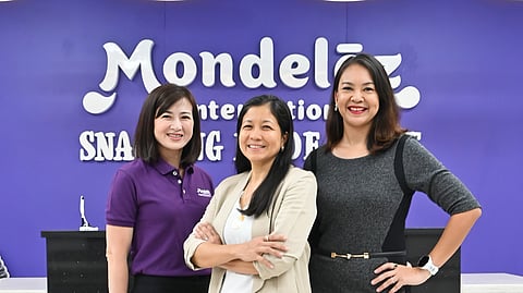 She leads the right way (From left) Mondelēz International’s Plant Director Tanya Lim, Managing Director Aleli Arcilla, and General Counsel Mae Corona guide the organization’s journey towards its mission to empower people to snack right.