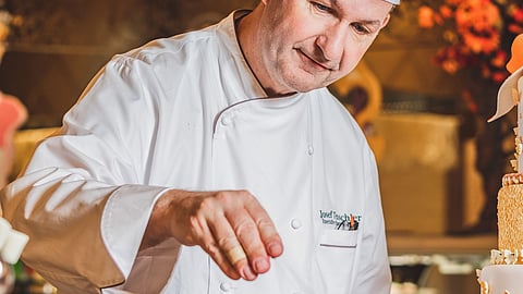 Chef Josef Teuschler, director of culinary of Okada Manila, gives a finishing touch to a delightful side dish. 