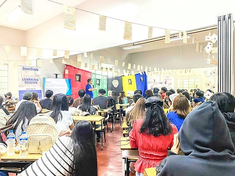 NATIONAL Teachers College business students listening intently to Ed Saguibo’s talk on quantitative decision making in financial wellness.