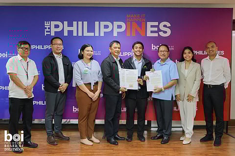 BOI officials with CTGRI representatives during a brief awarding ceremony at the BOI Main office last 24  June. 