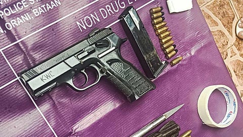 Employee arrested for illegal possession of guns, bullets