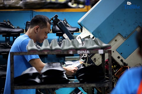 (July, 09 2025) Workers meticulously assemble quality footwear at the Cpoint shoe manufactory warehouse in Marikina City on Wednesday. Dubbed as the “shoe capital” of the country, Marikina City aims to revitalize the craftsmanship of the shoemaking industry to the global market. pushing to entice more locals especially to the youth to join its footwear making industry as the city looks to revive the Philippines’ Shoe Capital.  Photo/Analy Labor