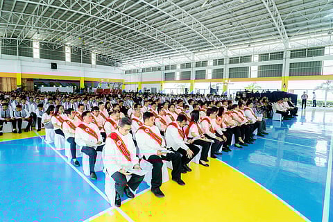 OFFICIALS of TMP Tech, instructors, and graduates gather for the school’s 14th commencement in Santa Rosa, Laguna.