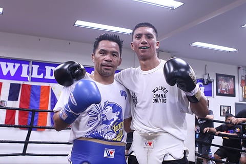 MANNY Pacquiao and youthful sparring partner Saul Bustos set the ring on fire during their four-round workout on Sunday morning (Manila time) at the Wild Card Boxing Club in Hollywood. 