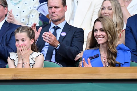 Princess Charlotte charms with pink nails and mom-inspired style
