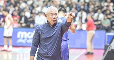 TNT head coach Chot Reyes heaves a sigh of relief after pulling off a dramatic 99-96 win over San Miguel Beer in Game 1 of the PBA Philippine Cup best-of-seven finals series late Sunday. 