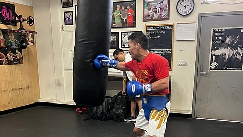 MANNY Pacquiao works on the heavy bag before leaving for Las Vegas, where he will face Mario Barrios in their WBC welterweight title fight this Saturday at the MGM Grand.   