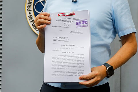 Lawyer and human rights advocate Erin Tañada III files a formal complaint before the Professional Regulation Commission (PRC) in Manila on Thursday, 17 July 2025. Tañada seeks the revocation of medical licenses of doctors allegedly involved in a multi-level marketing scheme, which he claims unethically preyed on sick and poor patients for profit. The complaint stems from revelations made during a Senate investigation into the pharmaceutical company’s practices.