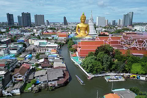 GIANT Buddha statue at the Wat Paknam Phasi Charoen Buddhist temple complex in Bangkok, Thailand. 
