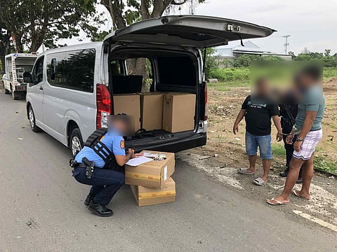 Two men were arrested by the police for transporting undocumented cigarettes in Gapan City on July 17, 2025.