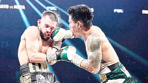 MARK Magsayo connects a wicked right hook on Jorge Mata during their WBC Continental Americas super featherweight title fight on Sunday (Manila time) at the MGM Grand Garden Arena in Las Vegas.