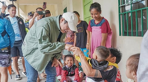 Manila Mayor Francisco ‘Isko Moreno’ Domagoso visits the evacuees at the Antonio Regidor Elementary School in Baseco amid the onslaught of the southwest monsoon in Metro Manila the past few days.