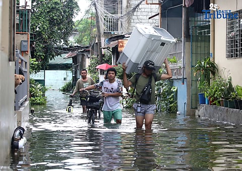 [FILE PHOTO] FLOODWATERS submerged parts of Cavite after Typhoon Crising, leaving thousands of families affected. BingoPlus Foundation delivered urgent aid and compassion to Barangays Poblacion 4A, Poblacion 4B, Malagasang 2B, and Anabu F in Imus, Cavite.