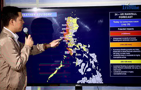 PAGASA weather specialist Benison Estareja briefs the public on the latest developments on Tropical Storm Dante and Typhoon Emong at the PAGASA Weather and Flood Forecasting Center on Thursday, July 24, 2025. Estareja warned of potential storm surges and flooding in several areas as both systems continue to affect the country’s weather.