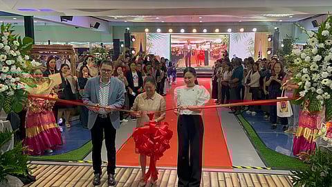 FIRST Lady Liza Araneta-Marcos (center) leads the ribbon-cutting ceremony for the 2025 DTI Bagong Pilipinas National Trade Fair on Friday at SM Megamall. She is joined by Trade Secretary Cristina Aldeguer-Roque and Go Negosyo founder Joey Concepcion.