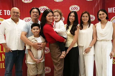 DIMPLES Romana beams alongside CDO’s Ong family: Jason Ong, VP for Emerging Businesses; Dr. Charmaine Ong-Castro, SVP for Corporate Purchasing, Treasury and Corporate Governance; and Janna Marie Ong-Santos, Marketing Manager, during the launch of CDO’s new campaign, which celebrates everyday meals and shared family moments as she and her family join the brand as its newest ambassadors.