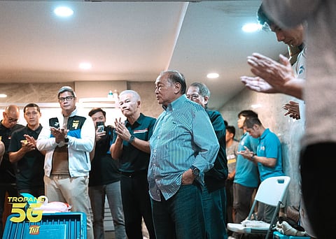 TNT boss Manny V. Pangilinan shares comforting words to lift the spirits of the Tropang  5G following a heartbreaking PBA Philippine Cup finals series defeat to San Miguel Beer, denying them a rare grand slam.