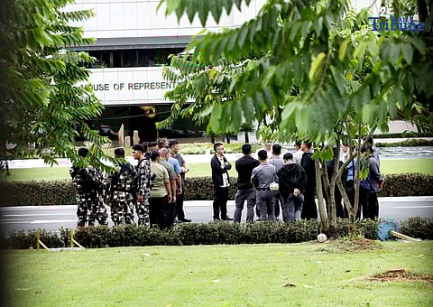 Members of the Malacañang Presidential Security Group (PSG) conduct a walkthrough outside the House of Representatives in Quezon City on Saturday, July 26, 2025, as part of the security preparations for President Ferdinand Marcos Jr.'s 4th State of the Nation Address.