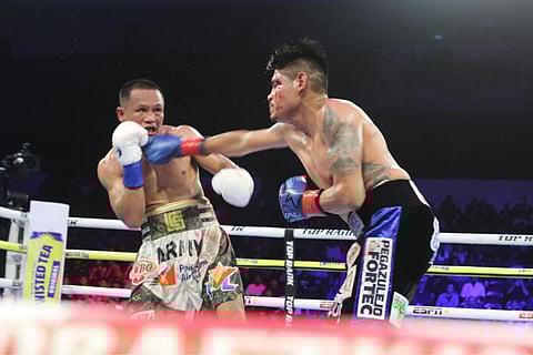 Charly Suarez (seen here battling Emanuel Navarrete last May in San Diego) remains in active rest as he braces for a rematch late this year.
