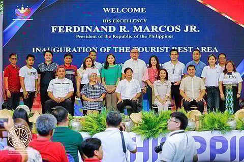 The first Tourist Rest Area (TRA) in the Ilocos Region was inaugurated by President Ferdinand R. Marcos, Jr. on May 17, 2024.  With the Ilocos region known for its well-preserved ancestral and heritage houses, the  building’s roofing was made of anahaw, a traditional material in the Ilocos Norte region, offering a distinctive look while serving a functional purpose as it helps prevent excessive heat buildup within the interior of the building, enhancing the comfort of visitors. It is located along the scenic Saud Bay in the town of Pagudpud.